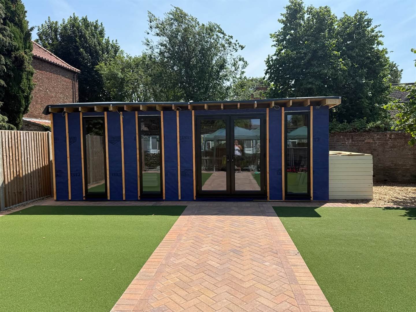 Glazing and doors fitted to the garden room